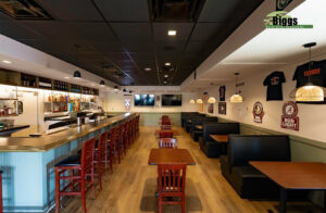 Jaco’s of Perdido Key Bar Keep area, Biggs Construction Company, Inc. Custom Wood Bar Counter Top and painted Bar Bead Board Bar front