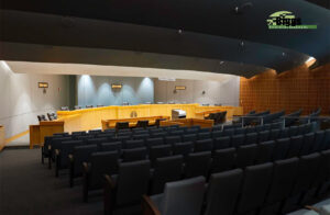 City of Pensacola Council Chambers. Biggs Construction Company, Inc. - Updated Cabinetry and added seamlessly add to existing City Council Chamber Dias, Podium, and Council Seating.